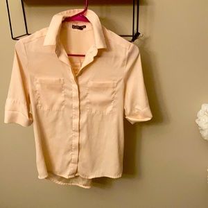 Light pink EXPRESS career blouse .